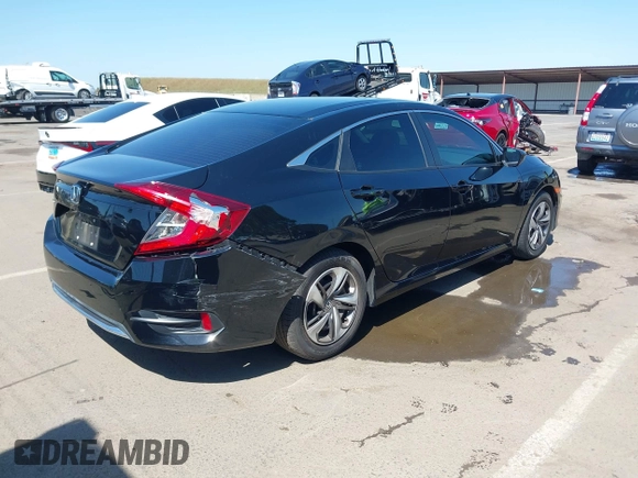 2019 Honda Civic Sedan LX with VIN 19XFC2F61KE202252, listed as a IAAI auction lot 42139362 with 37,128 mi miles. Bid and sale history available at carsss.com. Image 4.