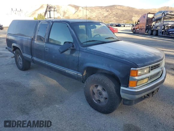 1997 Chevrolet Silverado 1500 with VIN 2GCEK19R3V1281262, listed as a Copart auction lot 41913745 with 218,949 mi miles and Clean Title. Bid and sale history available at DreamBid. Image 4.