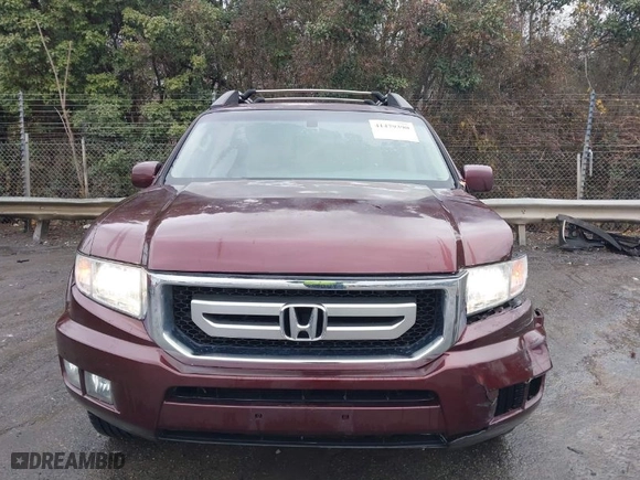 2009 Honda Ridgeline RTL with VIN 5FPYK16559B103698, listed as a IAAI auction lot 41479390 with 144,554 mi miles. Bid and sale history available at carsss.com. Image 12.
