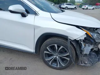 2019 Lexus RX 350 z VIN 2T2ZZMCA1KC136084, wystawiony jako IAAI lot #42430223 z przebiegiem 64 140 mil mil oraz . Historia ofert i sprzedaży dostępna na DreamBid. Obrazek 18.