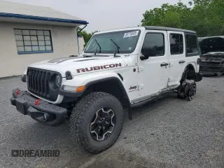 2023 Jeep Wrangler Rubicon with VIN 1C4JJXFM3PW585720, listed as a Copart auction lot 59776305 with 19,190 mi miles and Salvage title. Bid and sale history available at DreamBid. Image 1.