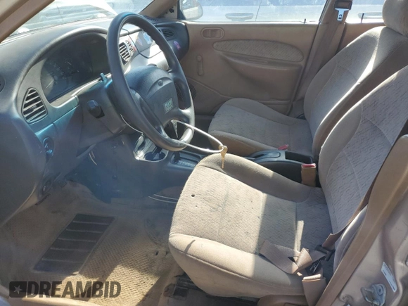 1997 Ford Escort LX with VIN 1FALP13P0VW403591, listed as a Copart auction lot 74321544 with 134,706 mi miles and Salvage Title. Bid and sale history available at DreamBid. Image 7.