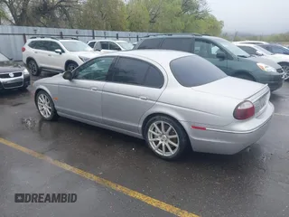 2005 Jaguar S-Type with VIN SAJWA03V451N24124, listed as a IAAI auction lot 42062179 with 286,268 mi miles and . Bid and sale history available at DreamBid. Image 3.