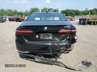 2024 BMW 5 Series 530i xDrive with VIN WBA53FJ04RCP87607, listed as a Copart auction lot 58768065 with 11,596 mi miles and Salvage title. Bid and sale history available at DreamBid. Image 6.