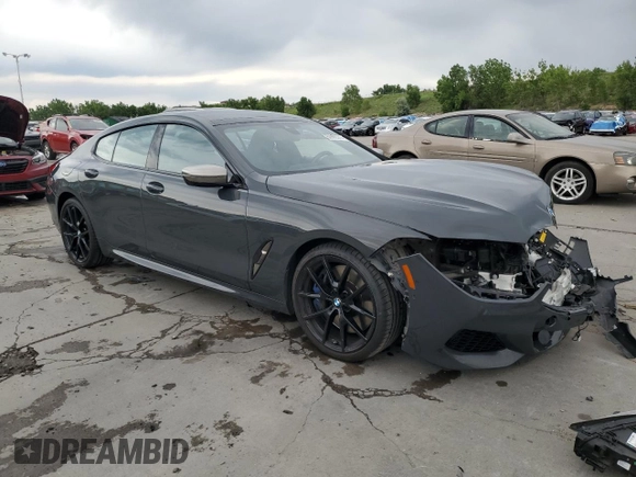 2020 BMW 8 Series M850i with VIN WBAGV8C0XLCD64228, listed as a Copart auction lot 60908315 with 67,643 mi miles and Salvage title. Bid and sale history available at DreamBid. Image 4.
