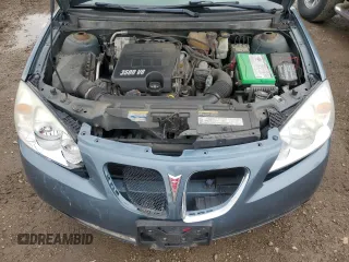 2005 Pontiac G6 GT z VIN 1G2ZH528654165958, wystawiony jako Copart lot #54258035 z przebiegiem 130 806 mil mil oraz Szkoda całkowita • Salvage title. Historia ofert i sprzedaży dostępna na DreamBid. Obrazek 11.