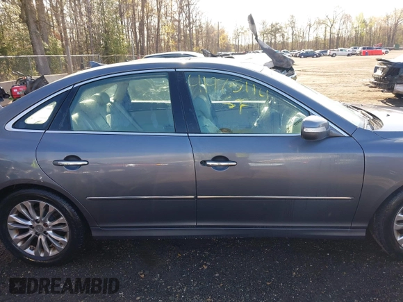 2011 Hyundai Azera Limited z VIN KMHFC4DF4BA559227, wystawiony jako IAAI lot #41975114 z przebiegiem 134 477 mil mil oraz . Historia ofert i sprzedaży dostępna na DreamBid. Obrazek 13.
