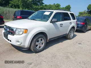2011 Ford Escape XLT z VIN 1FMCU9DG3BKB69543, wystawiony jako IAAI lot #42763900 z przebiegiem 82 676 mil mil oraz . Historia ofert i sprzedaży dostępna na DreamBid. Obrazek 2.