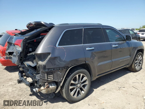 2017 Jeep Grand Cherokee Overland with VIN 1C4RJFCGXHC941983, listed as a Copart auction lot 52008825 with 65,776 mi miles and Salvage Title. Bid and sale history available at carsss.com. Image 3.