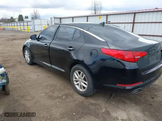 2012 Kia Optima LX with VIN KNAGM4A75C5297194, listed as a IAAI auction lot 41816301 with 119,064 mi miles. Bid and sale history available at carsss.com. Image 3.