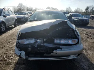 1999 Saturn SL z VIN 1G8ZK5270XZ212874, wystawiony jako Copart lot #85317464 z przebiegiem 153 477 mil mil oraz Szkoda całkowita • Salvage title. Historia ofert i sprzedaży dostępna na DreamBid. Obrazek 5.