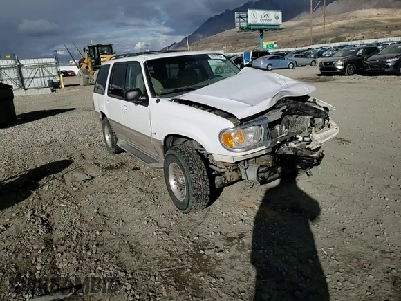 2000 Mercury Mountaineer with VIN 4M2DU66P8YUJ15148, listed as a Copart auction lot 84107204 with 194,511 mi miles and Salvage title. Bid and sale history available at DreamBid. Image 12.