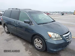 2005 Honda Odyssey EX-L z VIN 5FNRL38775B110232, wystawiony jako IAAI lot #42301513 z przebiegiem 277 389 mil mil oraz . Historia ofert i sprzedaży dostępna na DreamBid. Obrazek 1.