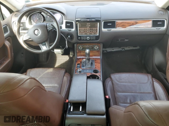 2011 Volkswagen Touareg Sport with VIN WVGFF9BPXBD005821, listed as a Copart auction lot 49391505 with 111,938 mi miles and Salvage Title. Bid and sale history available at DreamBid. Image 8.