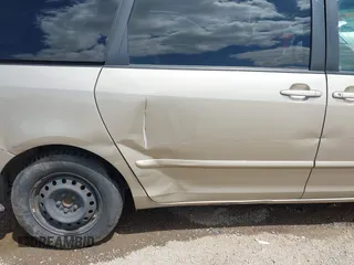 2010 Toyota Sienna CE z VIN 5TDKK4CC5AS327993, wystawiony jako IAAI lot #42227799 z przebiegiem 152 636 mil mil oraz . Historia ofert i sprzedaży dostępna na DreamBid. Obrazek 20.