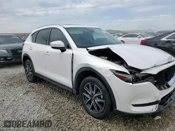 2018 Mazda CX-5 Grand Touring with VIN JM3KFBDM9J0468463, listed as a Copart auction lot 54524805 with 73,389 mi miles and Salvage Title. Bid and sale history available at DreamBid. Image 13.