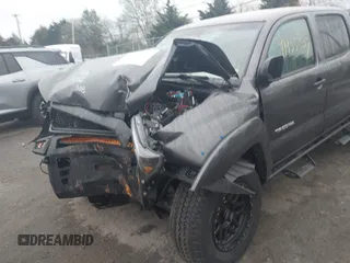 2012 Toyota Tacoma z VIN 3TMLU4EN9CM095110, wystawiony jako IAAI lot #41935207 z przebiegiem 177 543 mil mil oraz . Historia ofert i sprzedaży dostępna na DreamBid. Obrazek 6.