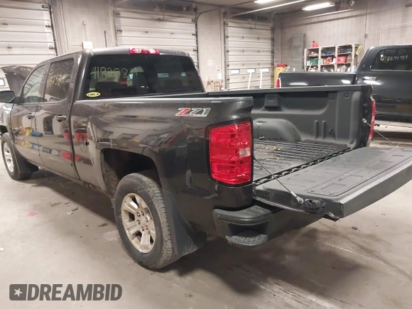 2016 Chevrolet Silverado 1500 LT with VIN 3GCUKRECXGG216804, listed as a IAAI auction lot 41825811 with 127,217 mi miles and . Bid and sale history available at DreamBid. Image 3.