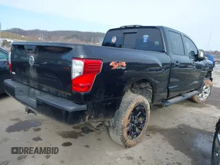 2018 Nissan Titan XD SV with VIN 1N6BA1F49JN521838, listed as a IAAI auction lot 41606878 with 143,742 mi miles. Bid and sale history available at carsss.com. Image 4.