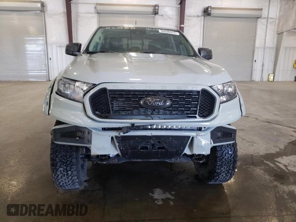2021 Ford Ranger XL with VIN 1FTER4FH2MLD97098, listed as a Copart auction lot 56696975 with 21,565 mi miles and Salvage title. Bid and sale history available at DreamBid. Image 5.