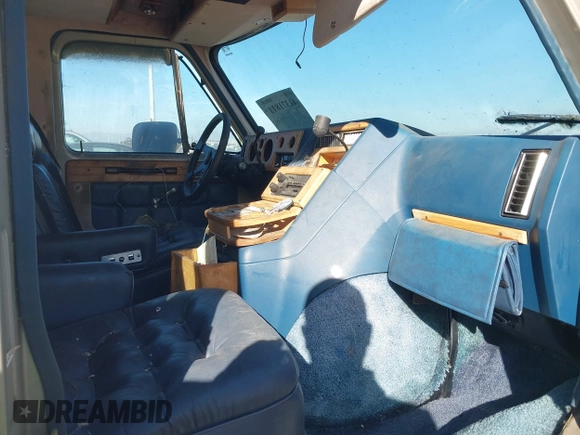1989 GMC Vandura z VIN 1GDEG25K1K7521984, wystawiony jako IAAI lot #41371811 z przebiegiem 43 502 mil mil oraz . Historia ofert i sprzedaży dostępna na DreamBid. Obrazek 5.