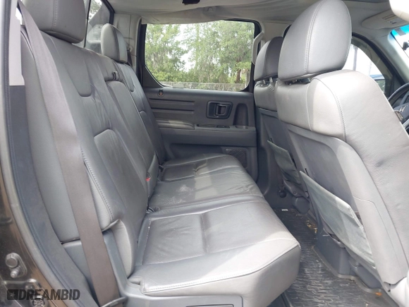 2007 Honda Ridgeline RTL w/Leather with VIN 2HJYK16527H515539, listed as a IAAI auction lot 42100067 with 186,864 mi miles. Bid and sale history available at carsss.com. Image 8.