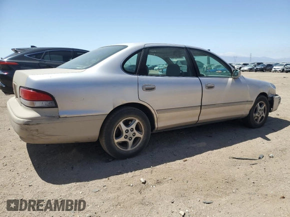 1997 Toyota Avalon XL with VIN 4T1BF12B0VU187179, listed as a Copart auction lot 54708565 with 336,922 mi miles and Salvage Title. Bid and sale history available at DreamBid. Image 3.