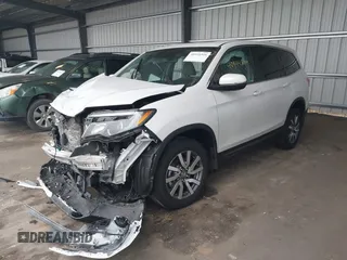 2022 Honda Pilot EX-L with VIN 5FNYF6H58NB097283, listed as a IAAI auction lot 40944566 with 22,027 mi miles and . Bid and sale history available at DreamBid. Image 17.