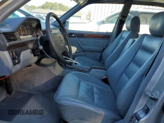 1993 Mercedes-Benz E Class with VIN WDBEA32E9PB936886, listed as a Copart auction lot 86800894 with 115,217 mi miles and Salvage Title. Bid and sale history available at carsss.com. Image 7.