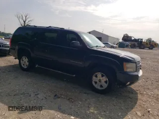 2011 Chevrolet Suburban LT z VIN 1GNSKJE31BR148448, wystawiony jako Copart lot #61057955 z przebiegiem 237 656 mil mil oraz Czysty tytuł • Clean title. Historia ofert i sprzedaży dostępna na DreamBid. Obrazek 4.