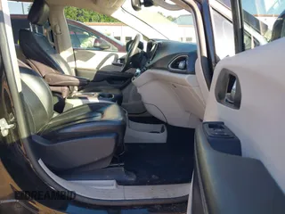 2022 Chrysler Pacifica Touring L with VIN 2C4RC1BG9NR117538, listed as a IAAI auction lot 42318518 with 103,311 mi miles and . Bid and sale history available at DreamBid. Image 5.