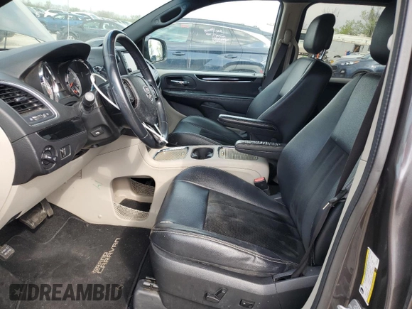 2014 Dodge Grand Caravan SXT 30th Anniversary with VIN 2C4RDGCG4ER285294, listed as a Copart auction lot 52109205 with 196,331 mi miles and Salvage Title. Bid and sale history available at DreamBid. Image 7.
