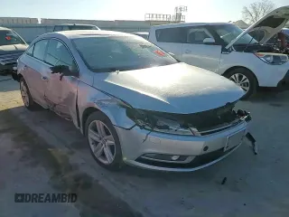 2014 Volkswagen CC Sport z VIN WVWBP7AN2EE505913, wystawiony jako Copart lot #42380915 z przebiegiem 98 976 mil mil oraz Szkoda całkowita • Salvage title. Historia ofert i sprzedaży dostępna na DreamBid. Obrazek 11.
