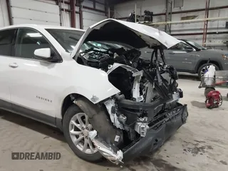 2018 Chevrolet Equinox LT z VIN 3GNAXJEV9JL410690, wystawiony jako IAAI lot #41571620 z przebiegiem 21 797 mil mil oraz . Historia ofert i sprzedaży dostępna na DreamBid. Obrazek 6.