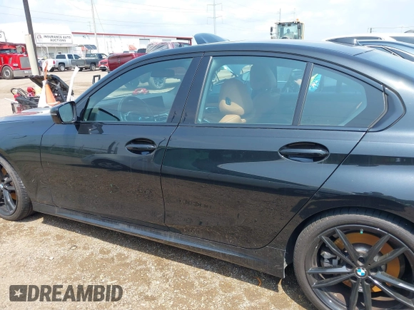 2023 BMW 3 Series 330i with VIN 3MW69FF09P8D39007, listed as a IAAI auction lot 42071643 with 24,781 mi miles and . Bid and sale history available at DreamBid. Image 14.