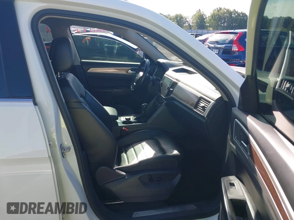 2018 Volkswagen Atlas SEL Premium with VIN 1V2NR2CA5JC571171, listed as a IAAI auction lot 42174807 with 131,690 mi miles and . Bid and sale history available at DreamBid. Image 5.