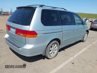 2003 Honda Odyssey EX with VIN 2HKRL18603H502236, listed as a IAAI auction lot 41929501 with 287,538 mi miles and . Bid and sale history available at DreamBid. Image 4.