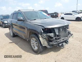 2020 Jeep Grand Cherokee Laredo E with VIN 1C4RJEAG2LC284912, listed as a IAAI auction lot 42114881 with 86,579 mi miles and . Bid and sale history available at DreamBid. Image 1.
