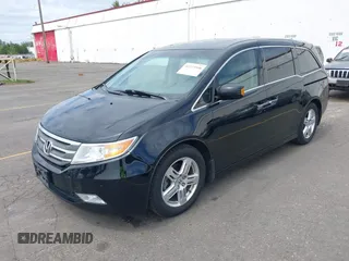 2012 Honda Odyssey Touring with VIN 5FNRL5H93CB121190, listed as a IAAI auction lot 42223998 with 154,358 mi miles and . Bid and sale history available at DreamBid. Image 18.