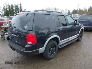 2002 Ford Explorer XLT z VIN 1FMZU73E42ZB66396, wystawiony jako IAAI lot #41919878 z przebiegiem 169 742 mil mil oraz . Historia ofert i sprzedaży dostępna na DreamBid. Obrazek 4.