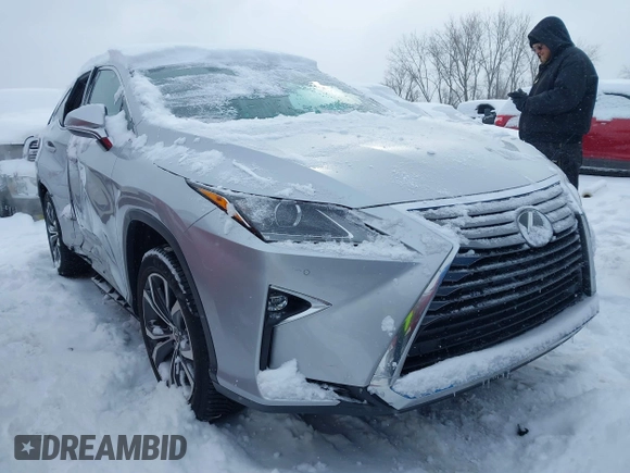 2018 Lexus RX 350L Premium z VIN JTJDZKCA9J2008933, wystawiony jako IAAI lot #41600527 z przebiegiem 93 423 mil mil oraz . Historia ofert i sprzedaży dostępna na DreamBid. Obrazek 1.