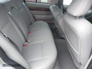 2004 Mercury Grand Marquis GS with VIN 2MEFM74W04X669087, listed as a IAAI auction lot 42090394 with 172,008 mi miles. Bid and sale history available at carsss.com. Image 8.