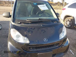 2009 Smart fortwo Pure с VIN WMEEJ31X69K331684, выставлен на аукционе IAAI как лот 41770804 с пробегом 112 611 миль миль и . История ставок и продаж доступна на DreamBid. Изображение 6.