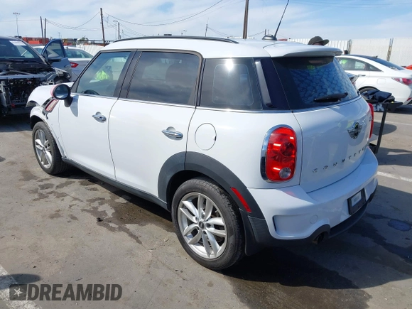 2014 MINI Countryman S with VIN WMWZC3C52EWP26869, listed as a IAAI auction lot 41756310 with 91,941 mi miles and . Bid and sale history available at DreamBid. Image 3.