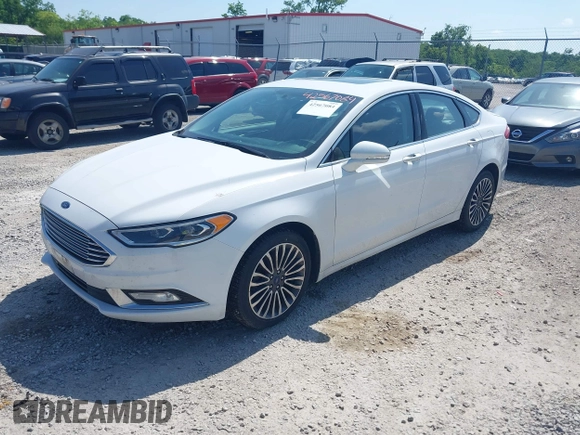 2018 Ford Fusion Titanium with VIN 3FA6P0D98JR134230, listed as a IAAI auction lot 42567084 with 107,459 mi miles and . Bid and sale history available at DreamBid. Image 17.