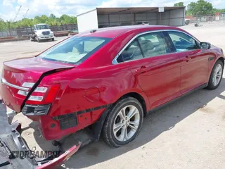 2014 Ford Taurus SEL z VIN 1FAHP2E89EG126922, wystawiony jako IAAI lot #42236235 z przebiegiem 176 917 mil mil oraz . Historia ofert i sprzedaży dostępna na DreamBid. Obrazek 4.
