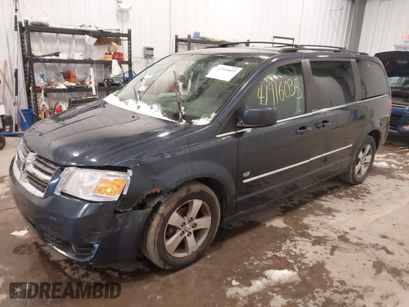 2009 Dodge Grand Caravan SXT z VIN 2D8HN54X89R645251, wystawiony jako IAAI lot #41916035 z przebiegiem 183 678 mil mil oraz . Historia ofert i sprzedaży dostępna na DreamBid. Obrazek 2.