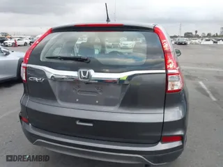 2015 Honda CR-V LX with VIN 3CZRM3H39FG706958, listed as a IAAI auction lot 41549880 with 85,567 mi miles. Bid and sale history available at carsss.com. Image 17.