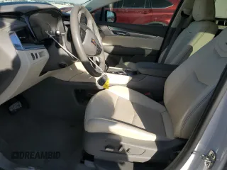 2022 Cadillac XT5 FWD Premium Luxury with VIN 1GYKNCRS1NZ125487, listed as a Copart auction lot 42081675 with 67,702 mi miles and Salvage title. Bid and sale history available at DreamBid. Image 7.