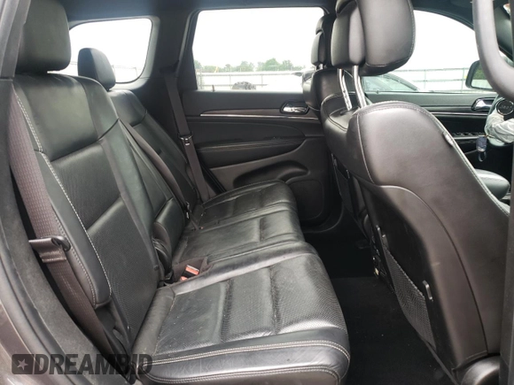 2021 Jeep Grand Cherokee 80th Anniversary z VIN 1C4RJEBG7MC679667, wystawiony jako Copart lot #54167225 z przebiegiem 77 268 mil mil oraz Szkoda całkowita • Salvage title. Historia ofert i sprzedaży dostępna na DreamBid. Obrazek 11.